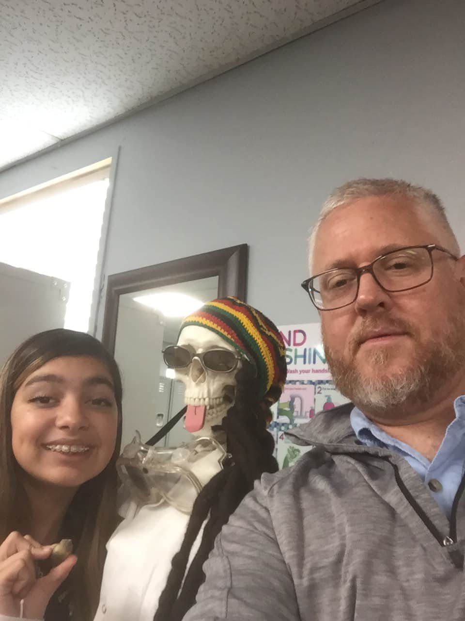 Emma, 8th grade, is pictured with her teacher Doug Nickalson.